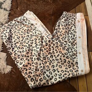 Adidas tearaway track pants in cheetah